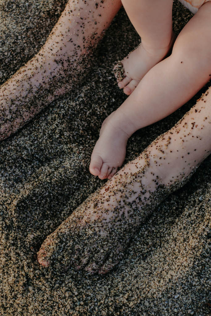 baby toes in sand