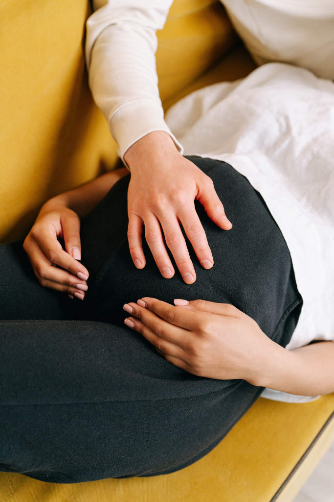 Couple practicing breathing techniques for birth